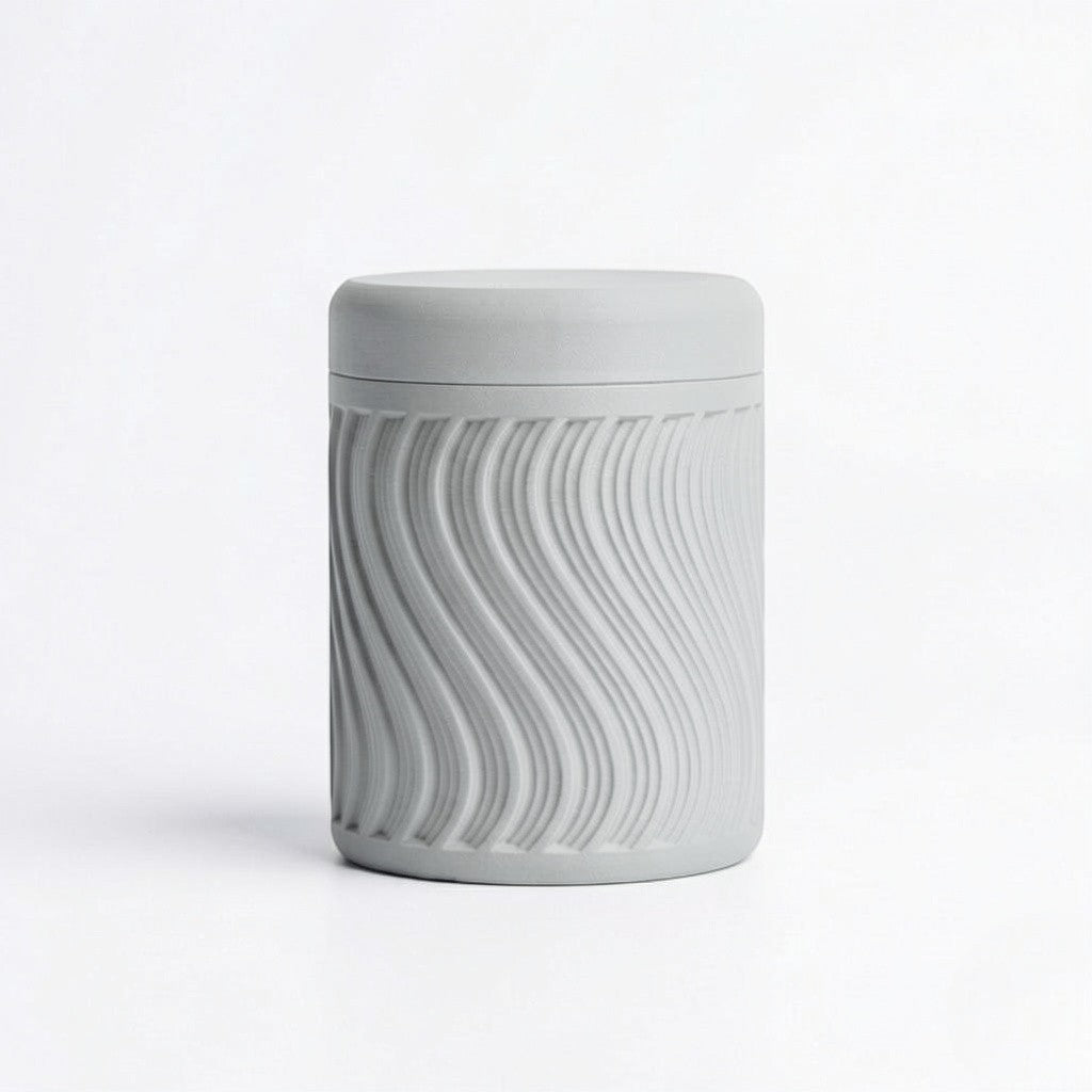 Lux Print Labs grey PLA storage container with a textured wave pattern and lid, perfect for trinkets.