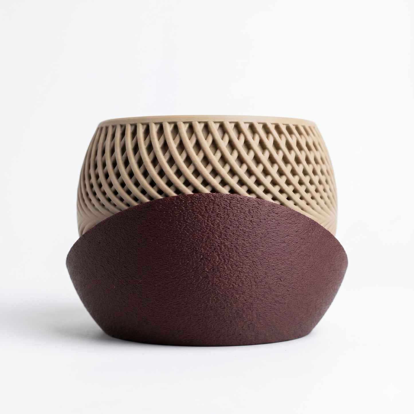 Ceramic container with textured top and smooth bottom on a white background