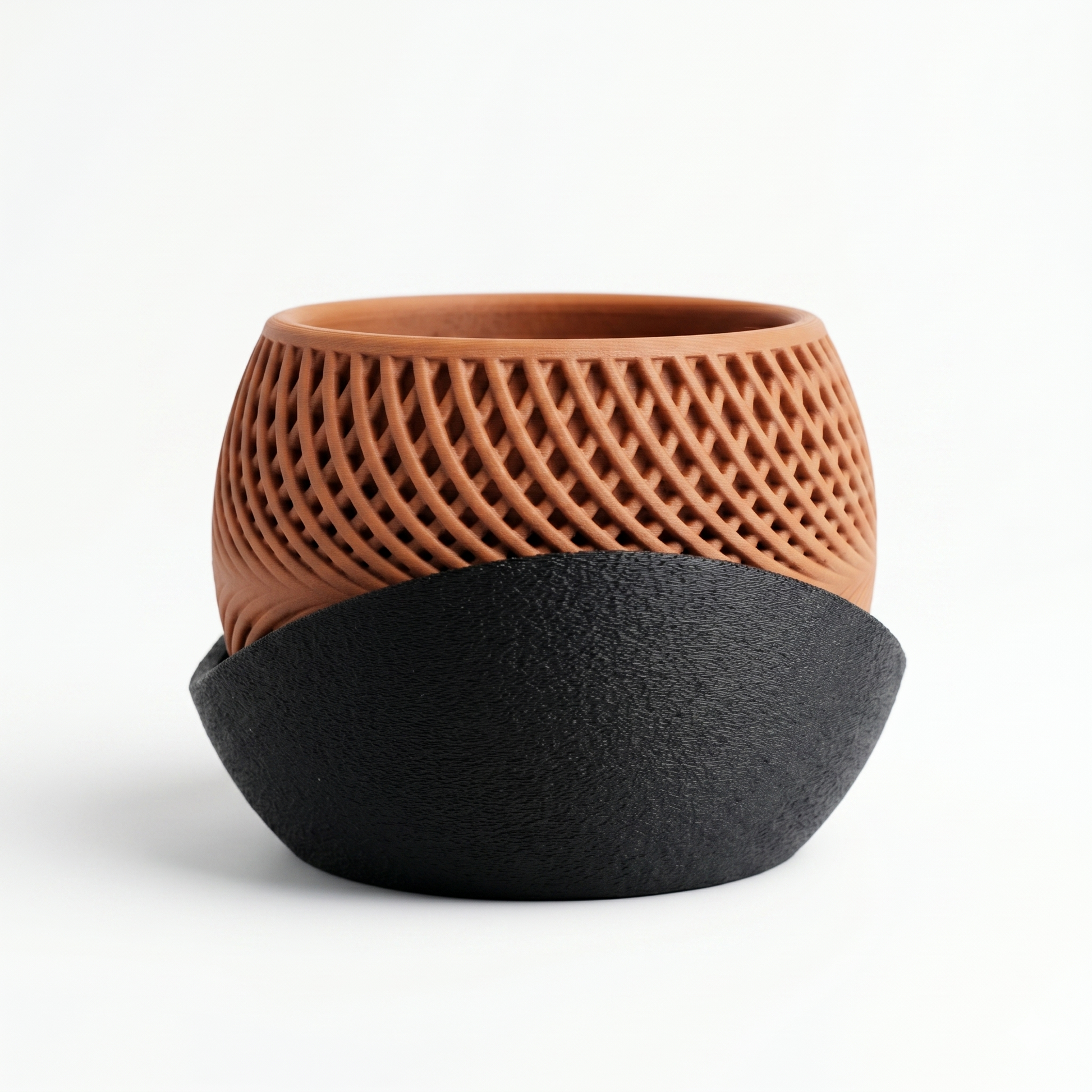 Ceramic planter with black base and textured brown top on a white background
