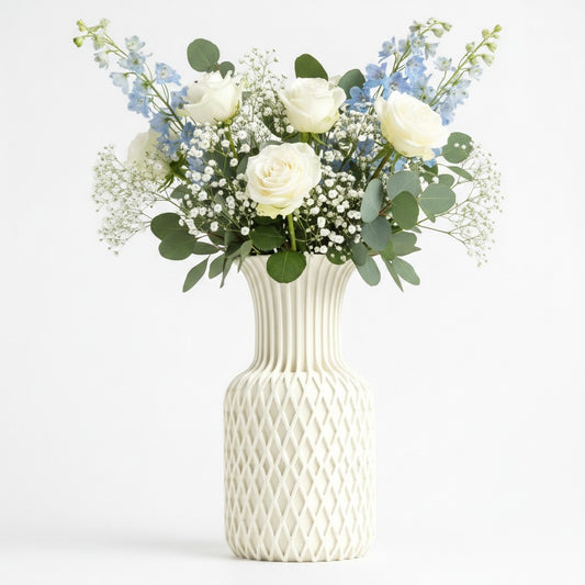 Juno Vase in white with diamond lattice pattern and fluted neck, styled with white roses, gypsophila and blue delphiniums — 3D printed decorative vase by Lux Print Labs