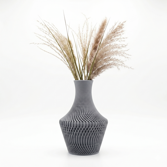 Lucid Vase in grey with twisted open-weave spiral pattern, styled with dried pampas grass — 3D printed decorative vase by Lux Print Labs