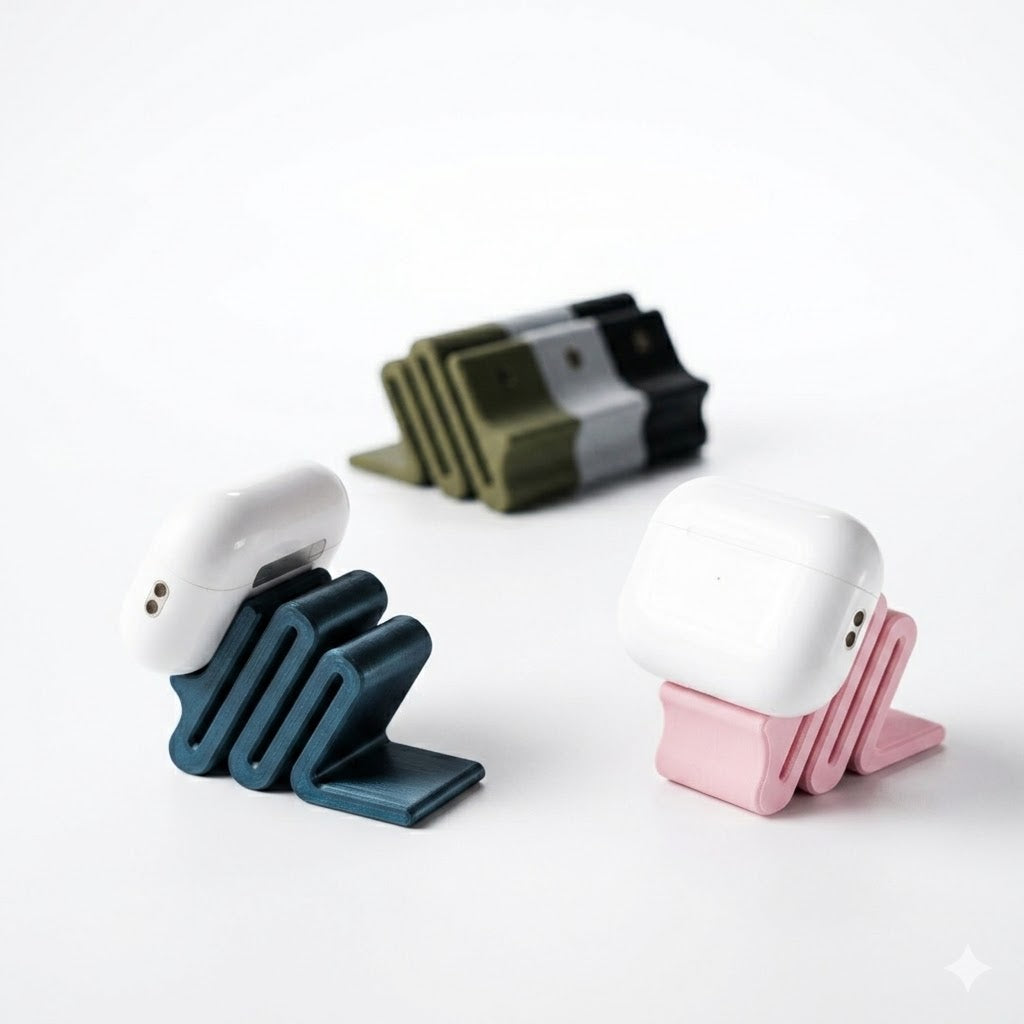 Caterpod magnetic AirPods stand in teal, pink and olive green with grey, shown holding AirPods and AirPods Pro cases — 3D printed desk accessory by Lux Print Labs