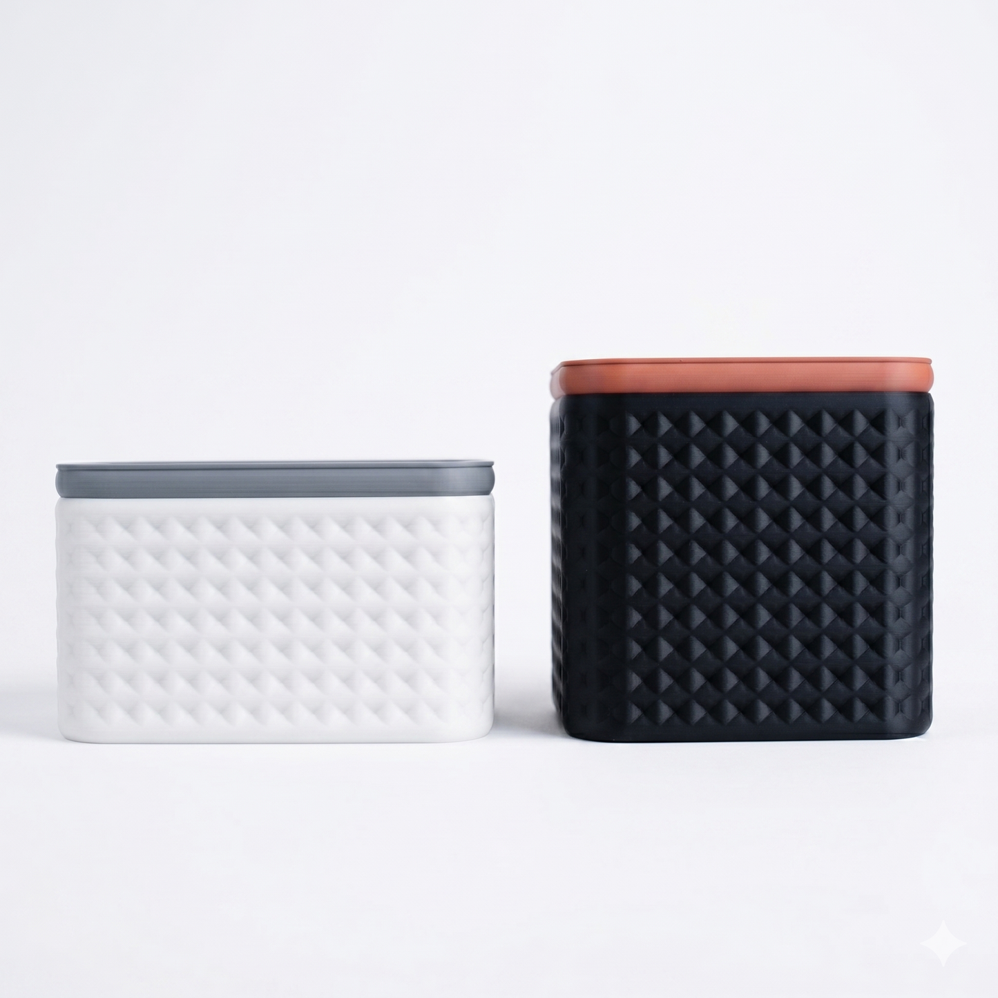 Tetra Container in two colour combinations — white with grey lid and black with terracotta lid — showing diamond pyramid textured pattern — 3D printed storage container by Lux Print Labs