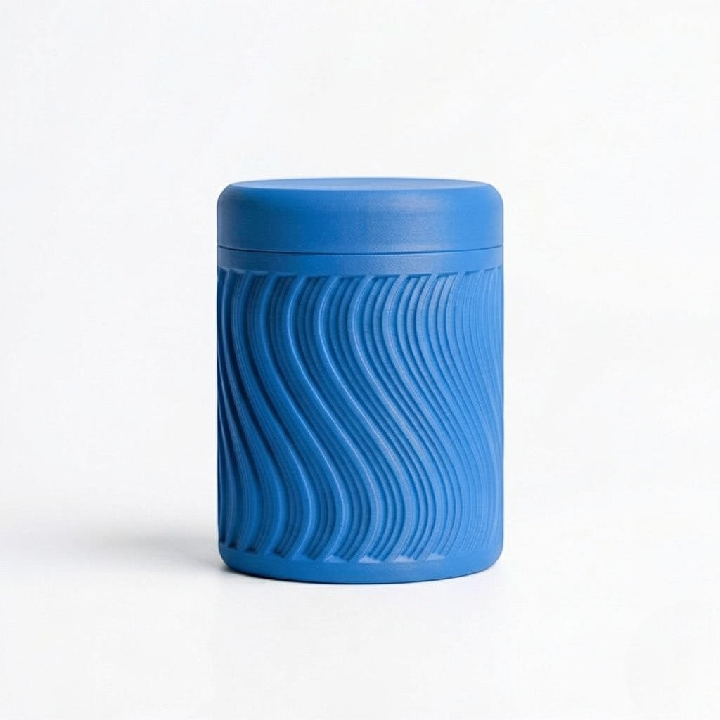 Lux Print Labs blue PLA 3D printed storage container with a textured wave pattern and lid.