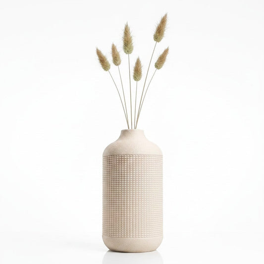 Lux Print Labs Faro Vase in matte beige with a textured gridded surface, holding dried stems against white background