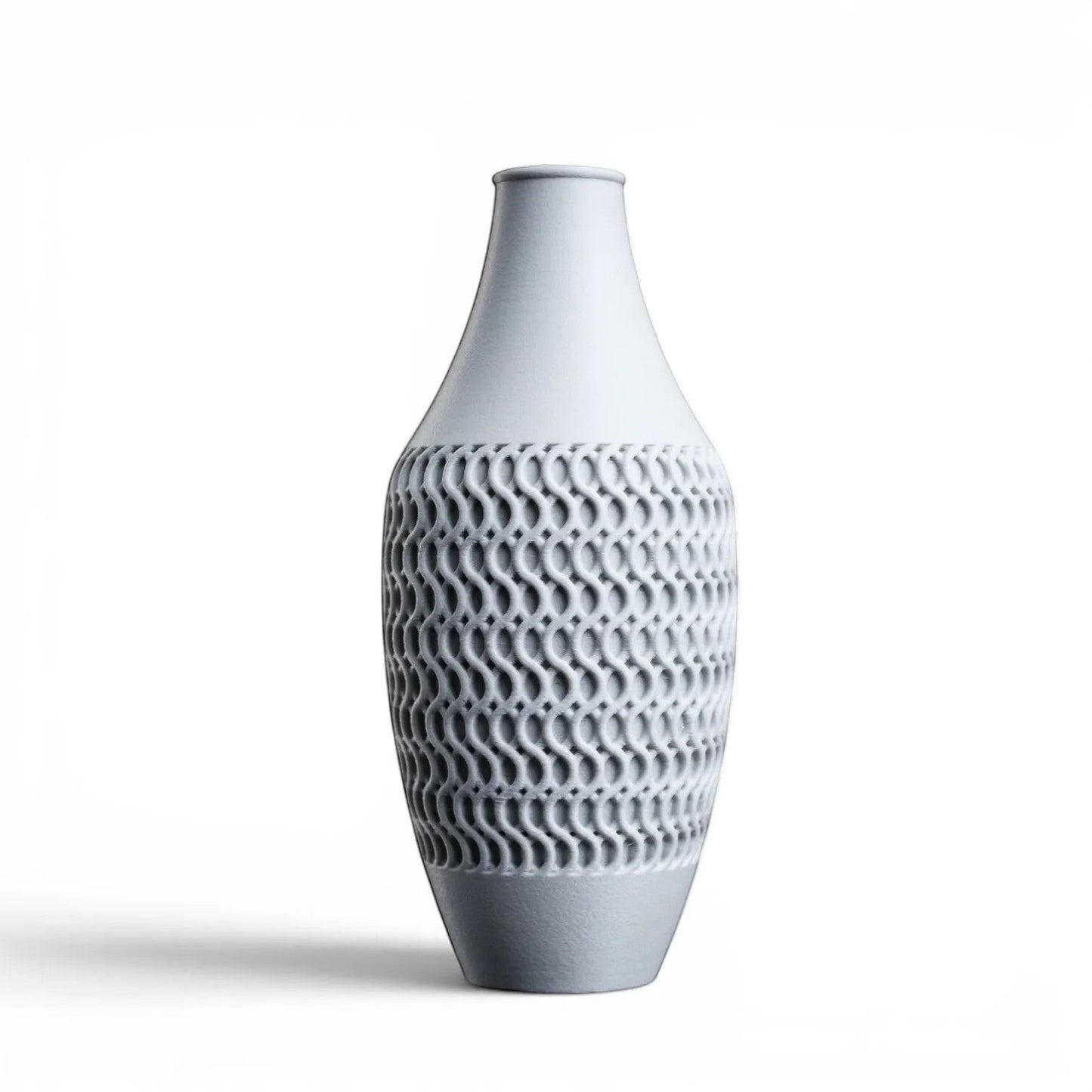 Lux Print Labs light grey ceramic vase with a textured geometric pattern. Modern decorative piece.