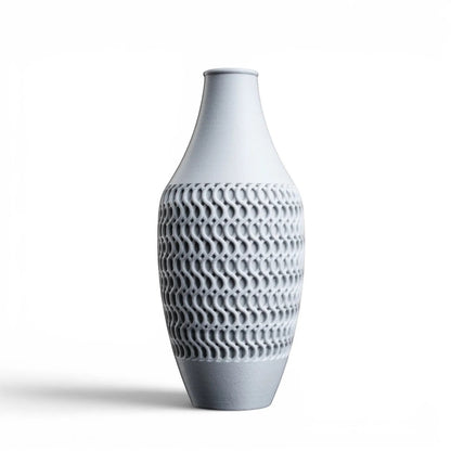 Lux Print Labs light grey ceramic vase with a textured geometric pattern. Modern decorative piece.
