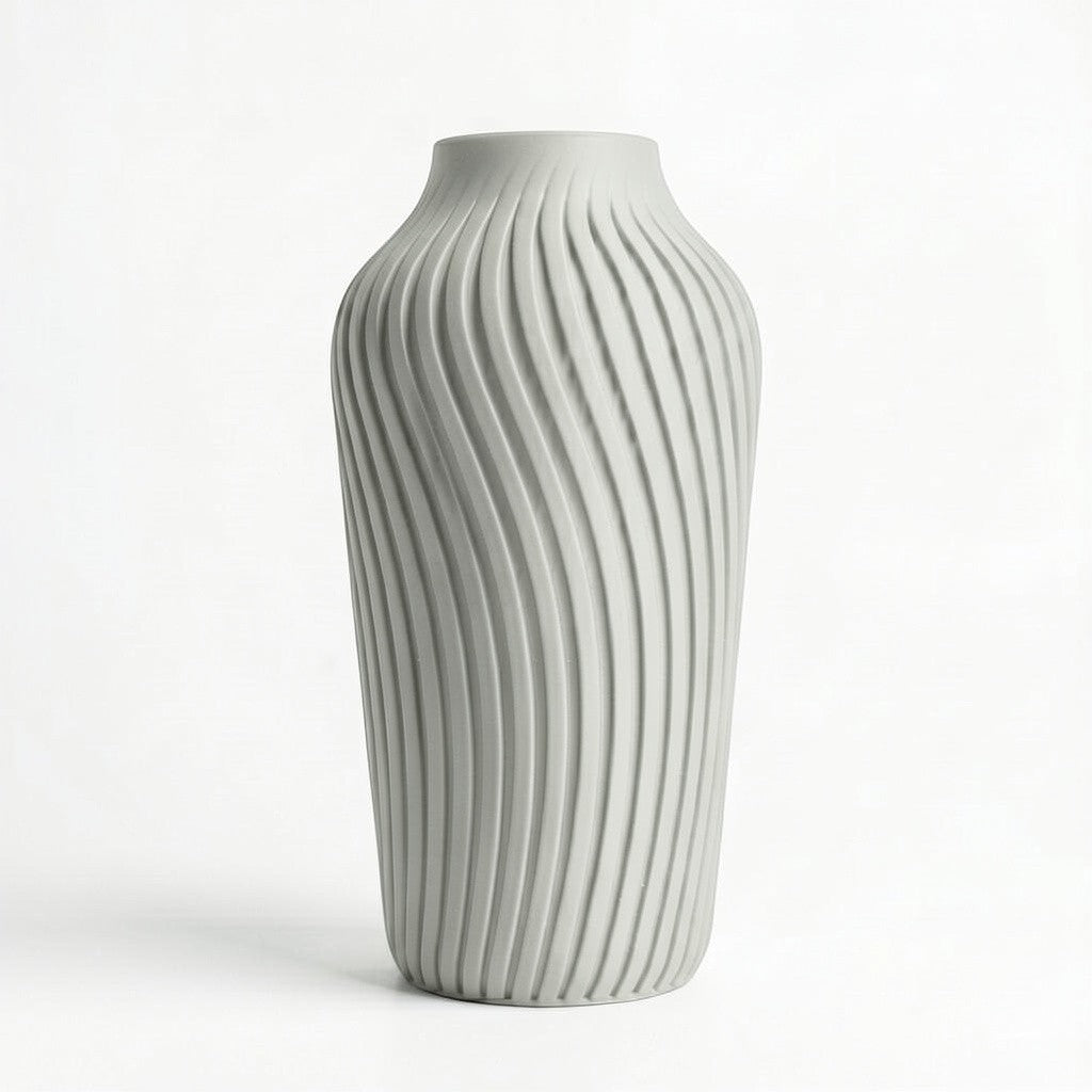 Lux Print Labs grey 3D printed vase with a radiating spiral pattern, available in two sizes.