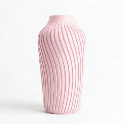 Lux Print Labs pink 3D printed vase with a spiraling ribbed texture, modern design.