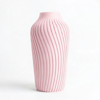 Lux Print Labs pink 3D printed vase with a spiraling ribbed texture, modern design, available in two sizes.
