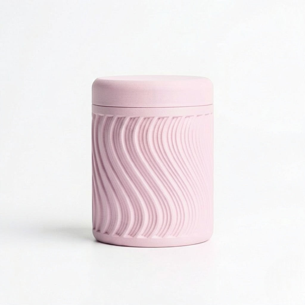 Lux Print Labs pink PLA storage container with a textured wave pattern and lid, perfect for trinkets.