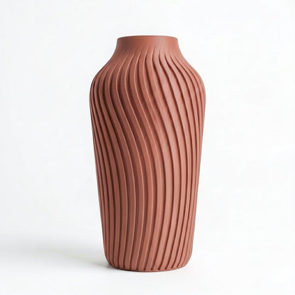 Lux Print Labs terracotta 3D printed vase with a radiating spiral pattern, available in two sizes.