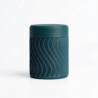 Lux Print Labs teal PLA storage container with a textured wave pattern and lid, perfect for trinkets.