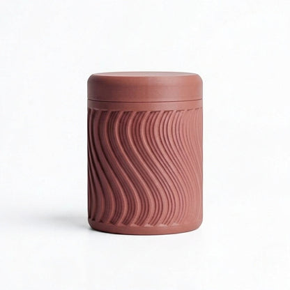 Lux Print Labs terracotta PLA storage container with a textured wave pattern and lid, perfect for trinkets.