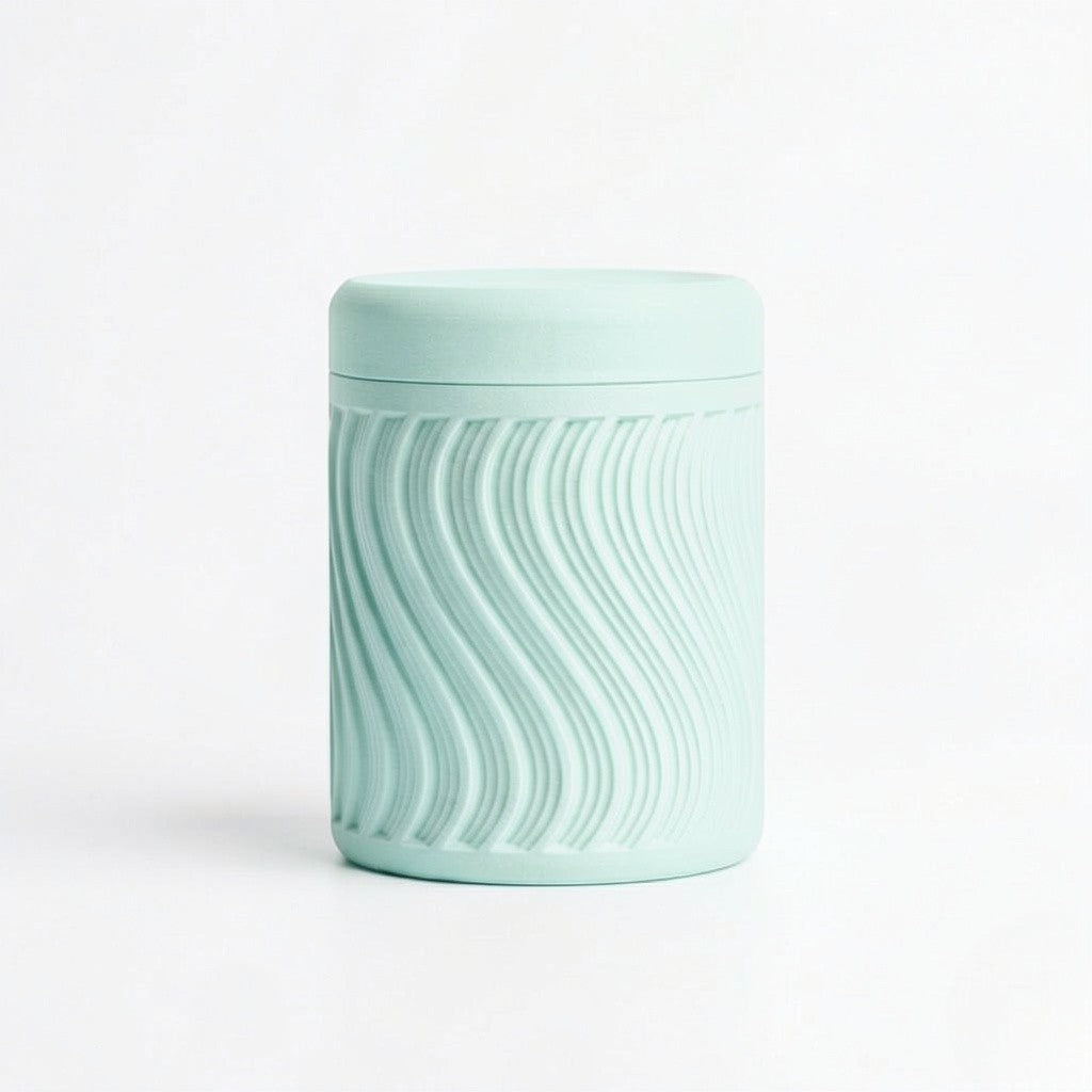 Lux Print Labs light blue PLA storage container with a textured wave pattern and lid.