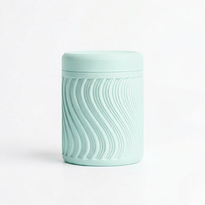 Lux Print Labs light blue PLA storage container with a textured wave pattern and lid.