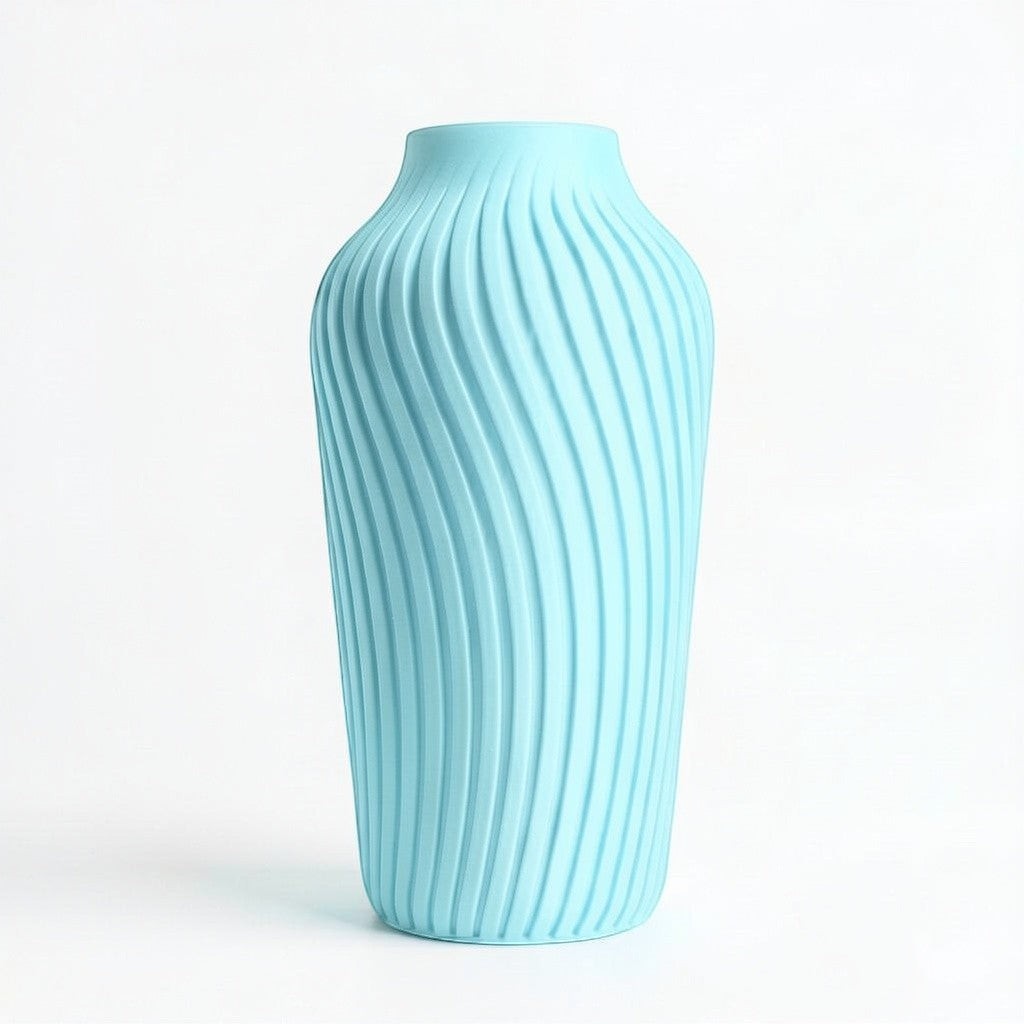 Lux Print Labs light blue 3D printed vase with a radiating spiral pattern, available in two sizes.