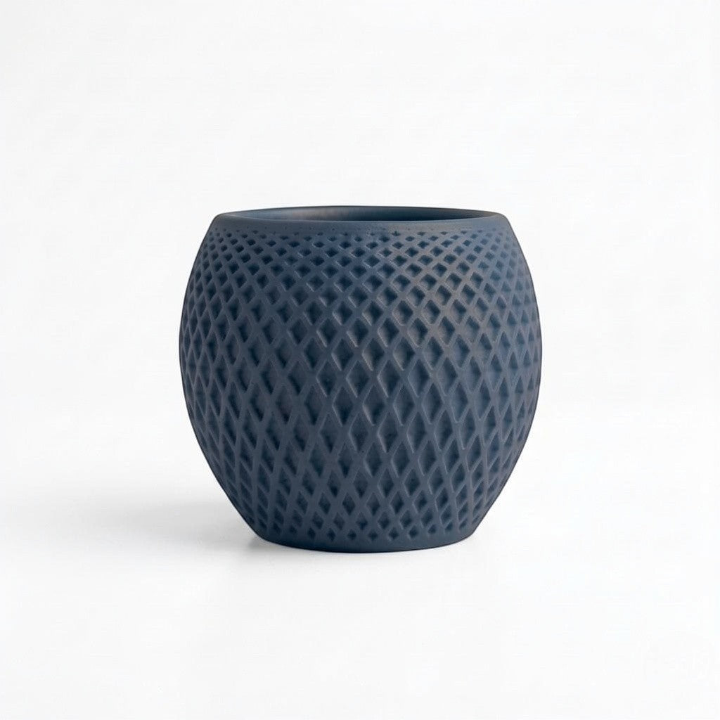 Lux Print Labs dark blue geometric diamond-weave PLA planter with a matte finish.
