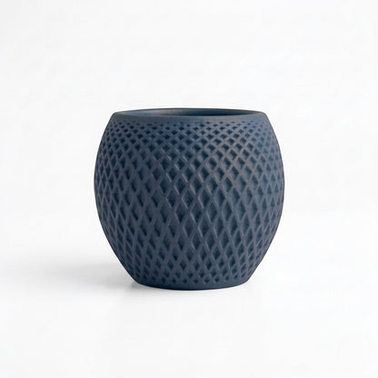 Lux Print Labs dark blue geometric diamond-weave PLA planter with a matte finish.