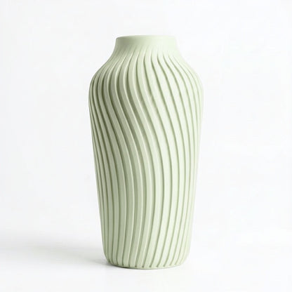 Lux Print Labs pale green 3D printed vase with a radiating spiral pattern, available in two sizes.