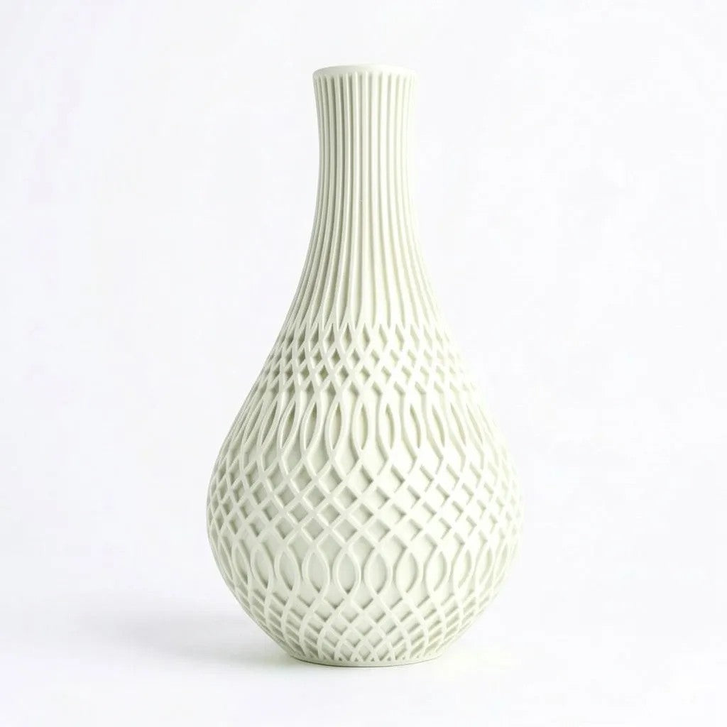 Lux Print Labs Inflect Vase in pale green, featuring a geometric transition from vertical fluting to a woven lattice pattern. Made from matte PLA.