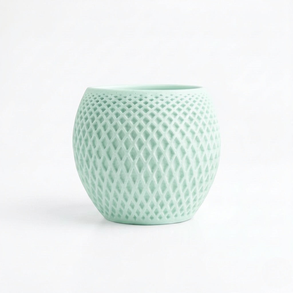 Lux Print Labs mint green geometric diamond-weave planter made from matte PLA with a solid drip tray.