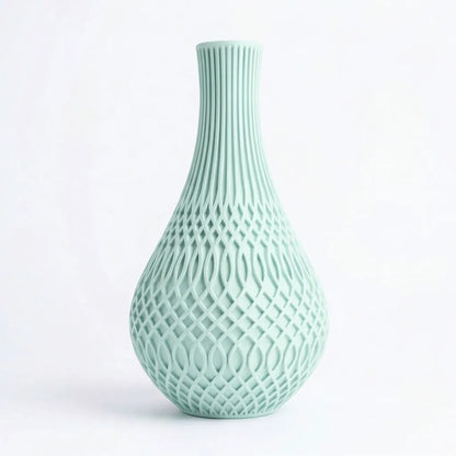 Lux Print Labs Inflect Vase in matte mint green PLA with geometric lattice pattern and vertical fluting.