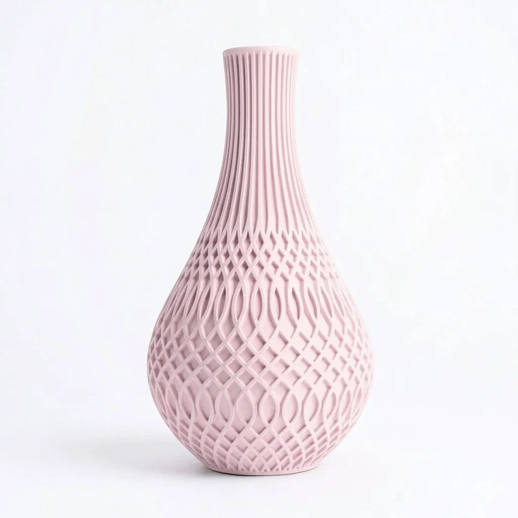 Lux Print Labs Inflect Vase in matte pink PLA with geometric lattice pattern and vertical fluting.