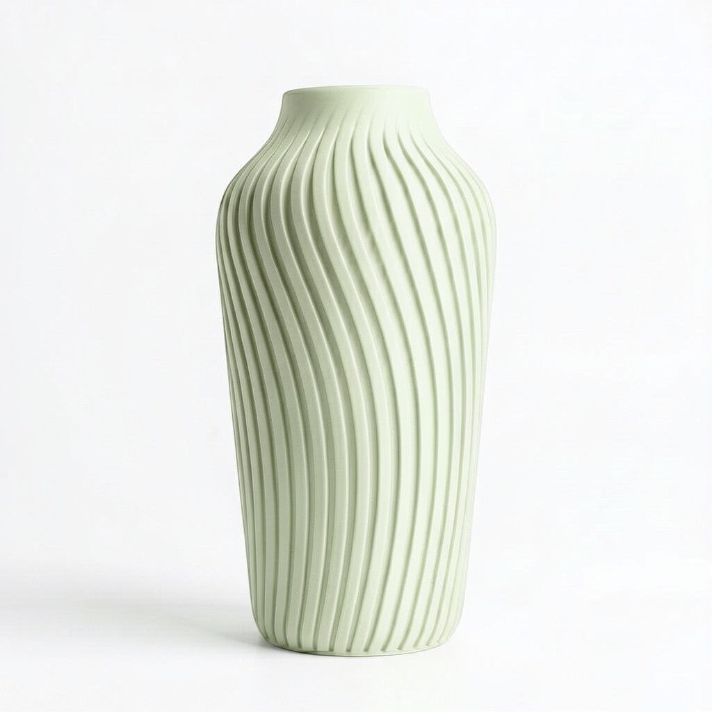 Lux Print Labs pale green 3D printed vase with a radiating spiral pattern, available in two sizes.