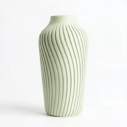 Lux Print Labs pale green 3D printed vase with a radiating spiral pattern, available in two sizes.